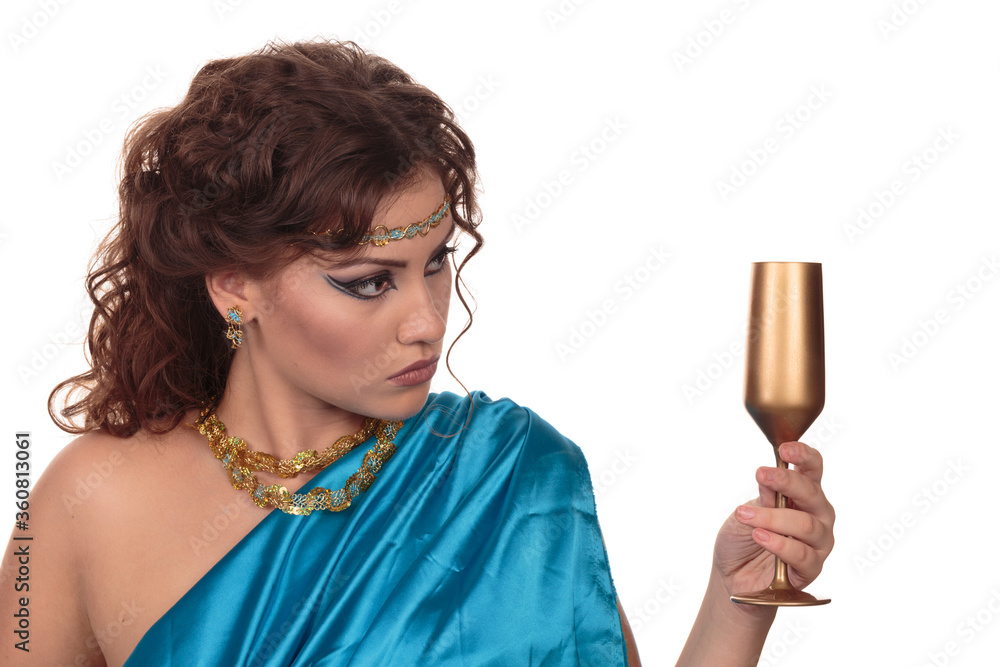 Woman portrait with a golden wineglass. Woman portrait with a golden wineglass.