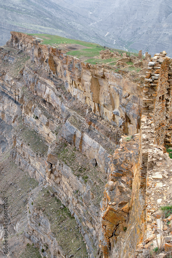 Naklejka premium Ruins of medieval Goor village (fortress). It is one of the most interesting and picturesque places in the region. Dagestan, North Caucasus, Russia.