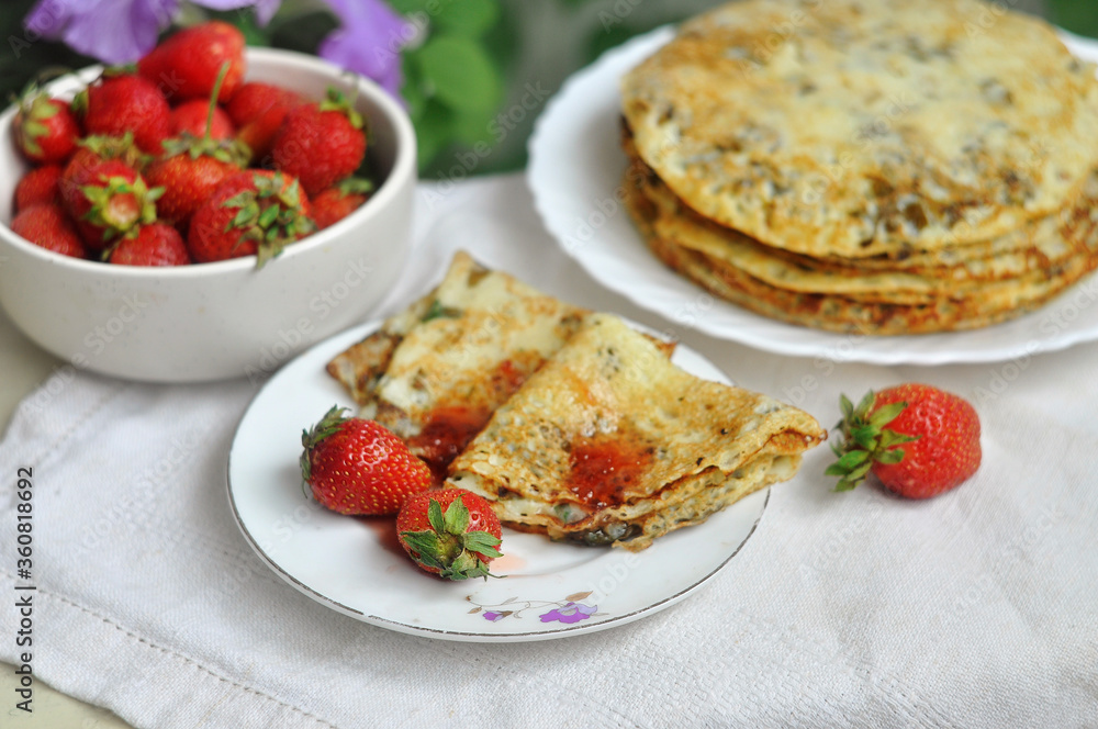 Homemade pancakes and fresh strawberries Homemade pancakes and fresh strawberries