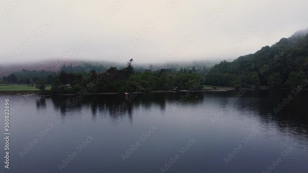 Slow Panning across Ullswater Lake during foggy conditions. Slow Panning across Ullswater Lake during foggy conditions.