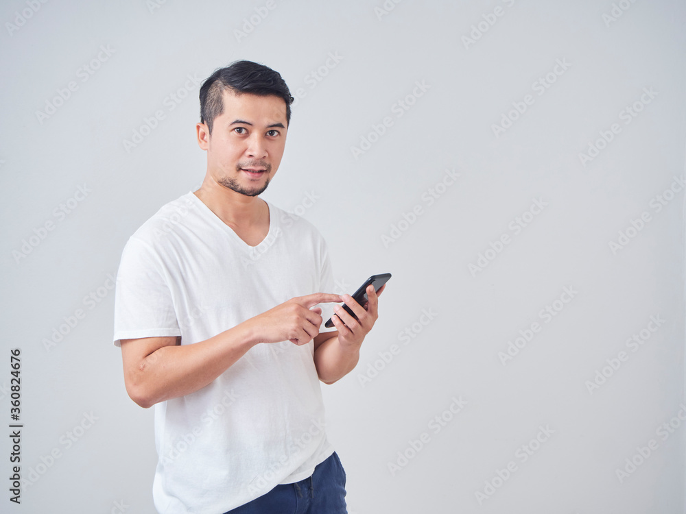 Handsome young man with smartphone. Handsome young man with smartphone.