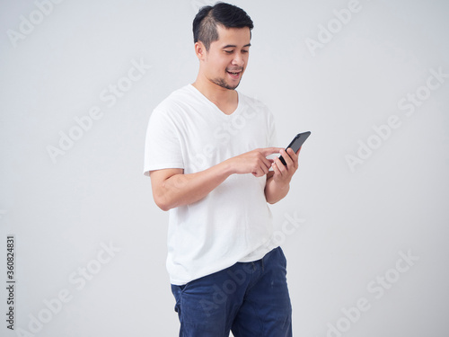 Handsome young man with smartphone.