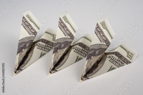 Airplanes of dollars are on...