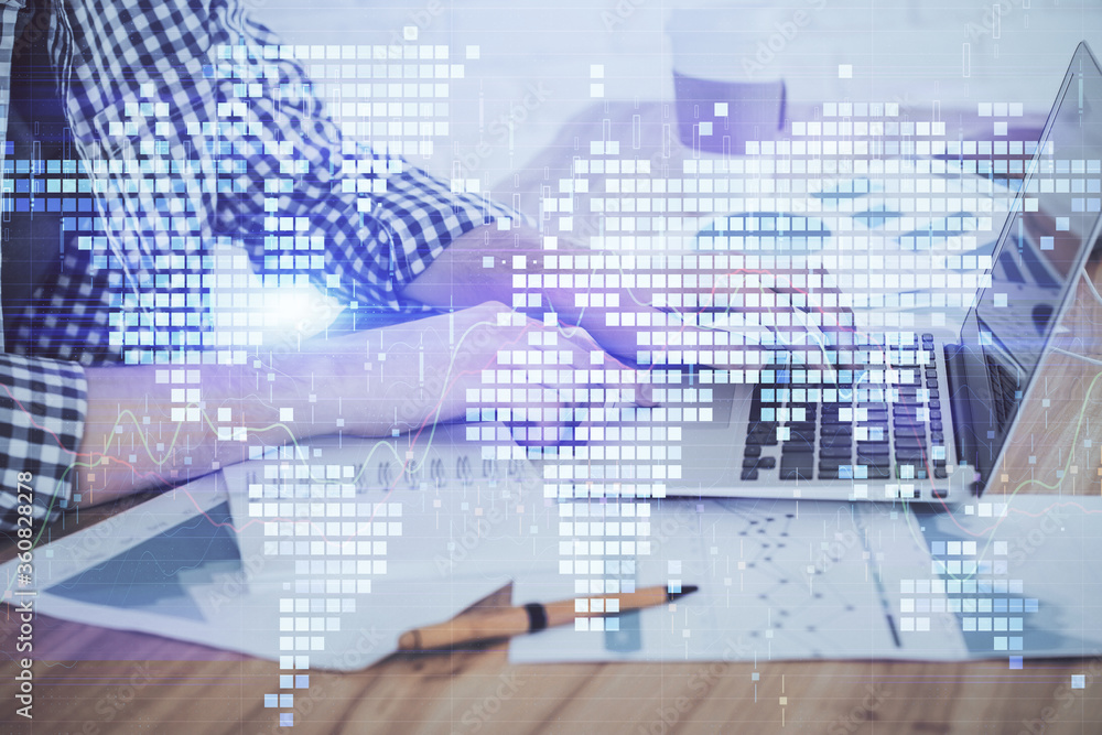 Multi exposure of businessman working on laptop on background. International business hologram in front. Concept of success. Multi exposure of businessman working on laptop on background. International business hologram in front. Concept of success.