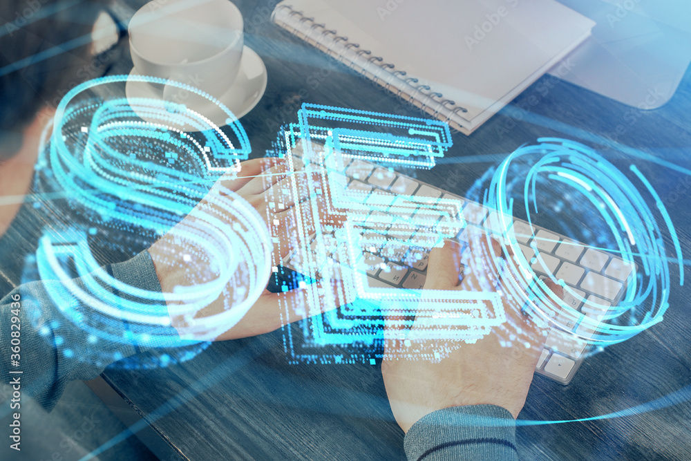Multi exposure of seo icon with man working on computer on background. Concept of search engine optimization. Multi exposure of seo icon with man working on computer on background. Concept of search engine optimization.