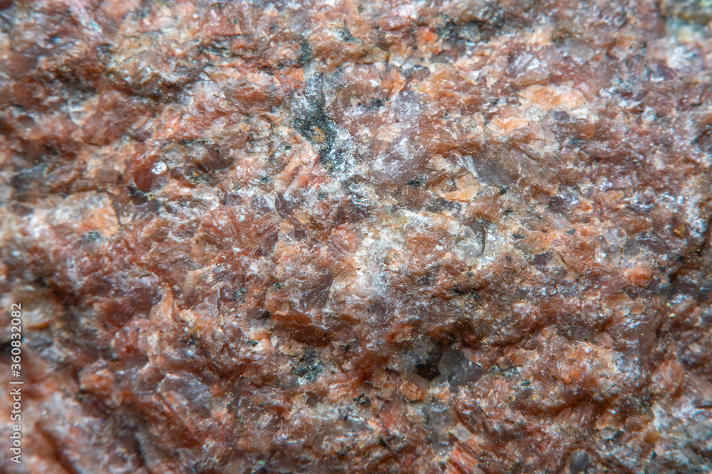 Blurred in soft focus background with the texture of the stone in warm, red tones. Blurred in soft focus background with the texture of the stone in warm, red tones.