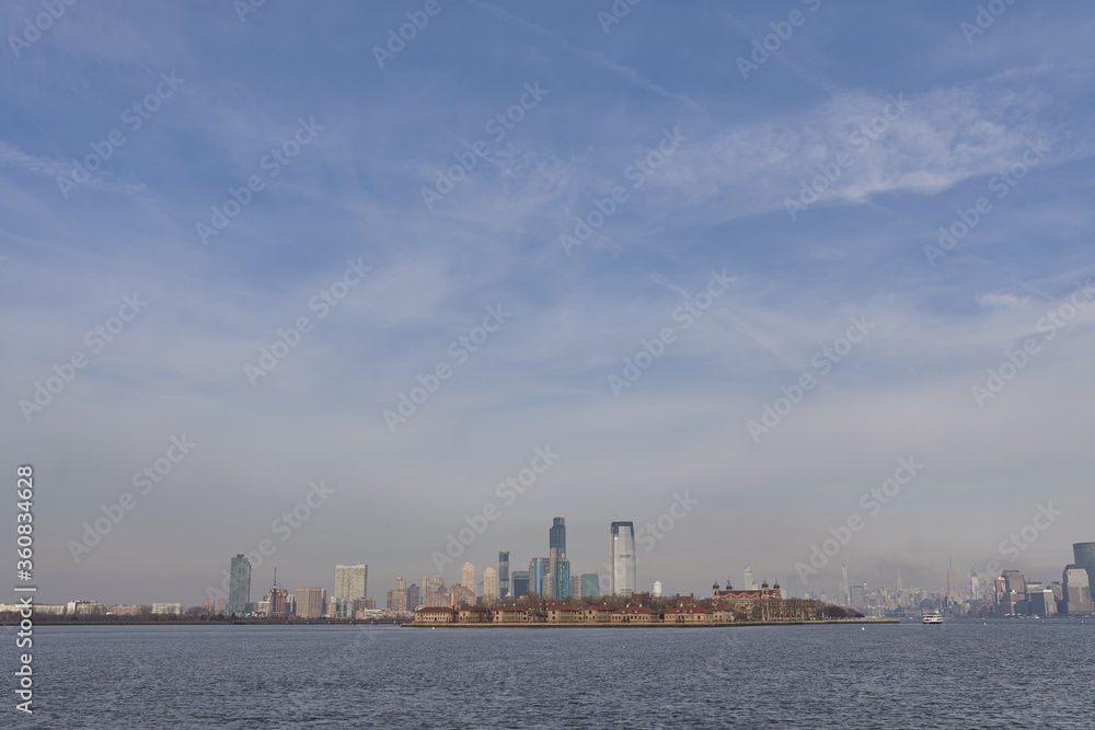 Manhatten skyline with Ellis Island