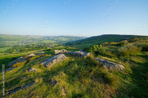 Along Baslow Edge to Curbar Edge and beyond on a bright  hazy summer morning.