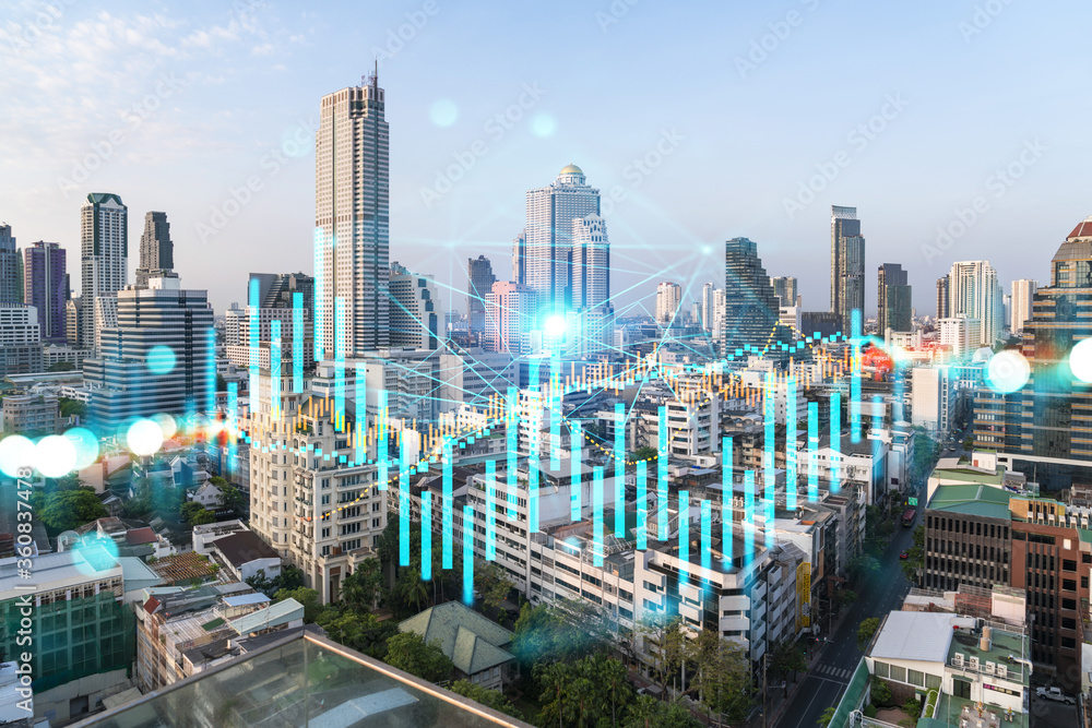 Obraz premium Day time bright Bangkok city background with business chart grid. Success and finance concept. Doublexposure