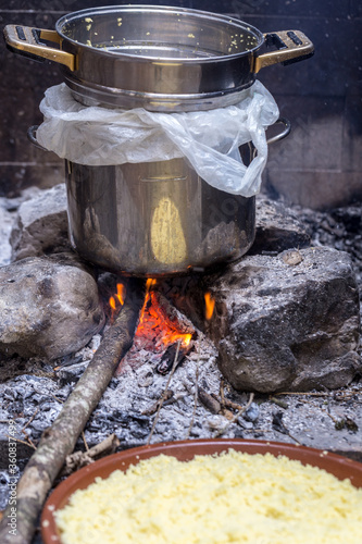 couscous pot on the fire, cooking Moroccan dish outdoors