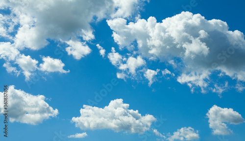 Blue sky background with white clouds, skyline panorama