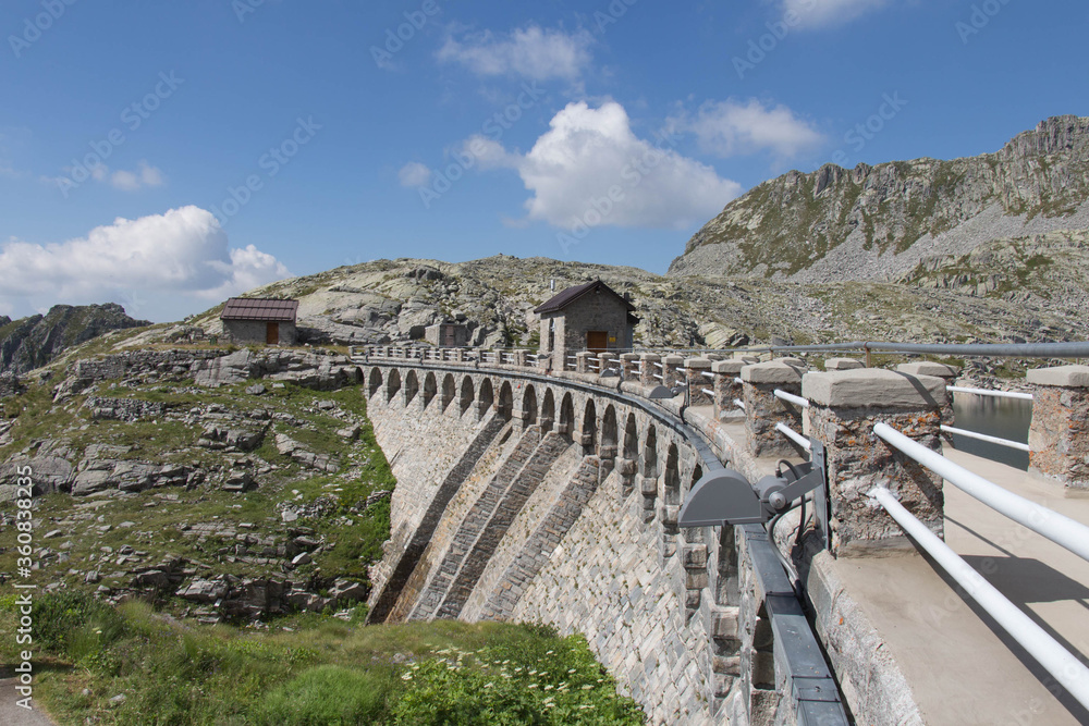 The view of dam at Lago della Vacca, Lombardy, Italy.