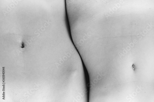 Details of body of beautiful girl, fashion and art, authentic black and white photo shoot