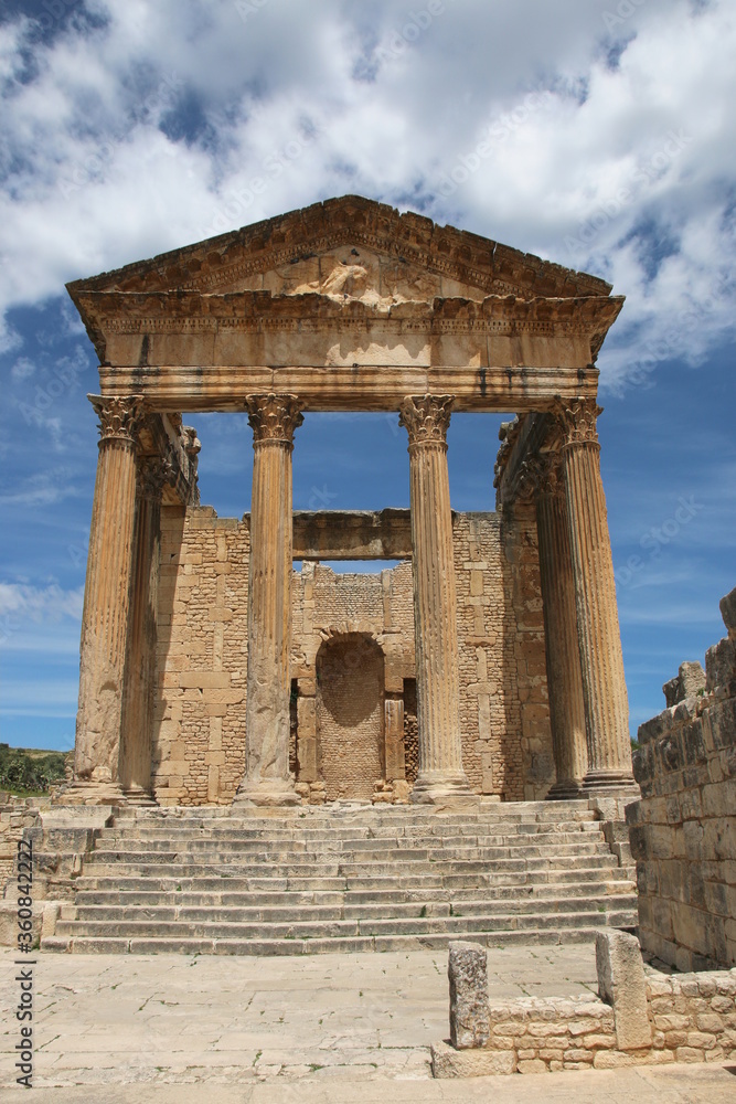 The remains and ruins of the Roman city of Dougga with the Capitol in Tunisia. 