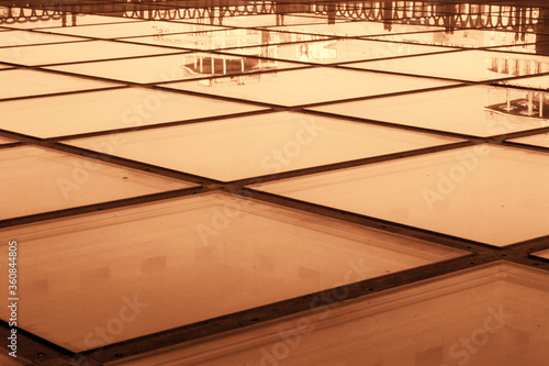 Orange glass panels with reflection