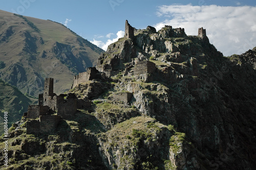 Ruined abandoned medieval village and fortress Muzo. Khevsureti Region, Georgia, Caucasus. photo