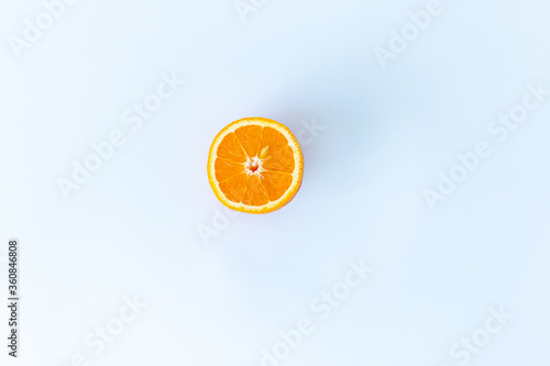 cut oranges are delicious and orange.