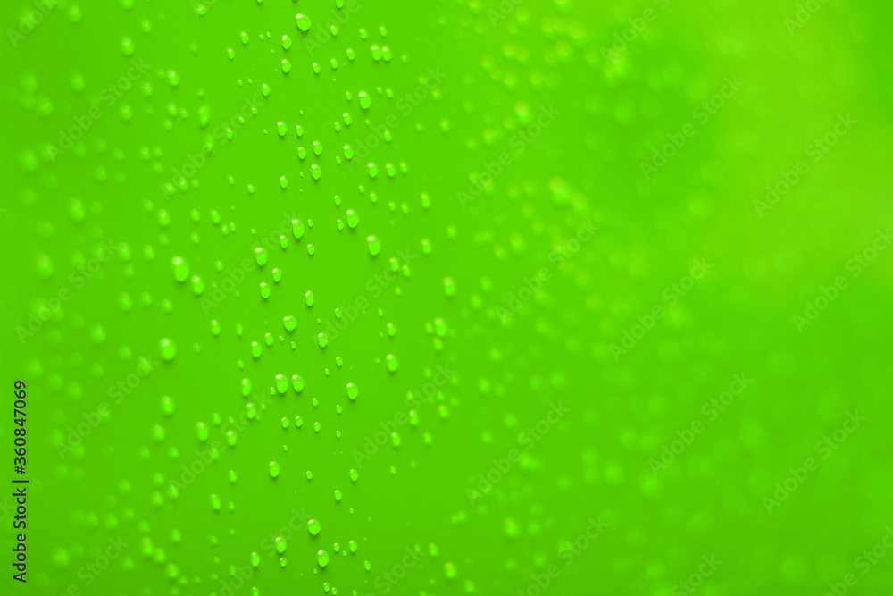 vivid green soft focus wall background surface with condensation dew water drops