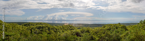 Panorama landscape with Ocean, Mountain, Trees, grass and sky, view from Camotes Island to Cebu Island