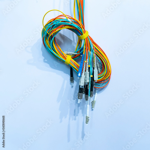 collection of different single mode fiber optic connectors photo