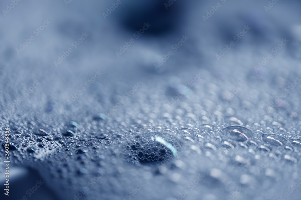 Blue water with soapy bubbles with narrow depth of field Blue water with soapy bubbles with narrow depth of field