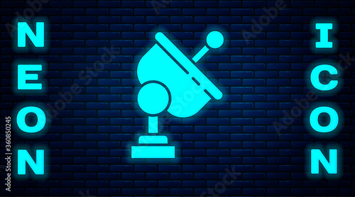 Glowing neon Radar icon isolated on brick wall background. Search system. Satellite sign.  Vector Illustration