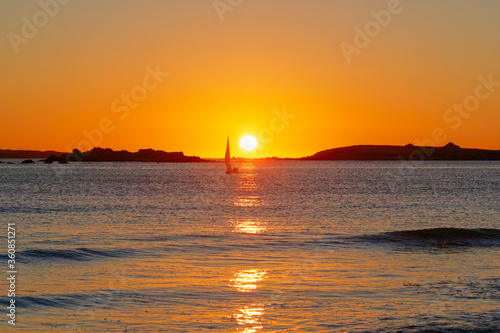 Sailing in the sunset at the end of the day in Northern Brittany