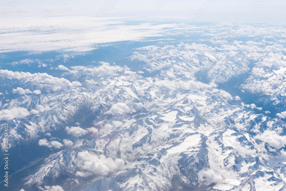 Aerial view from airplane window - Alps