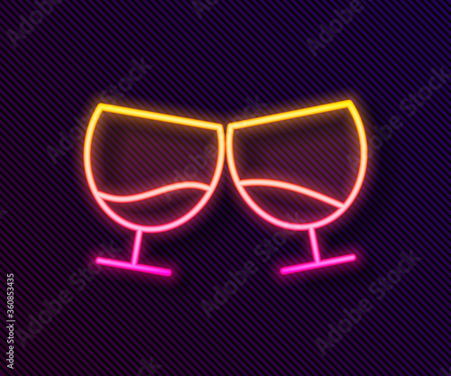 Glowing neon line Glass of cognac or brandy icon isolated on black background.  Vector Illustration