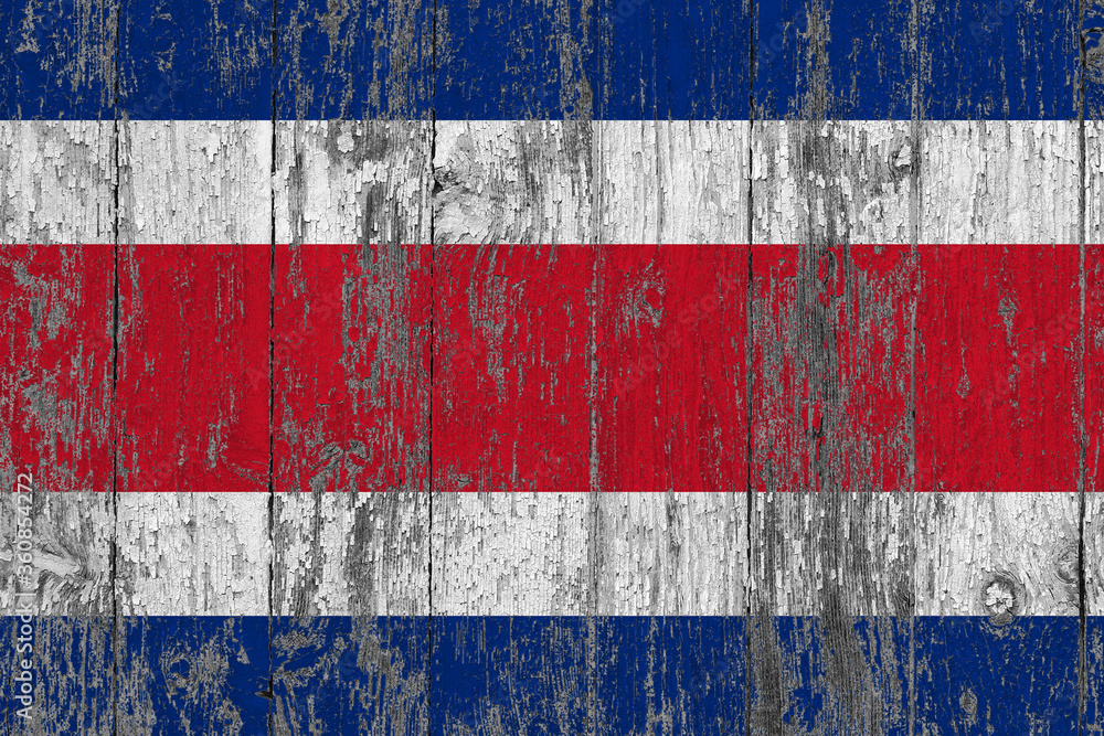 Costa Rica flag on grunge scratched wooden surface. National vintage background. Old wooden table scratched flag surface. Costa Rica flag on grunge scratched wooden surface. National vintage background. Old wooden table scratched flag surface.