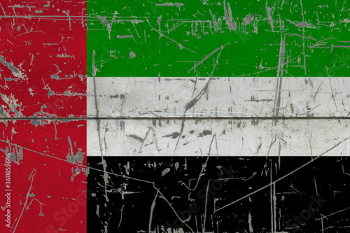 Photography United Arab Emirates flag painted on cracked dirty surface