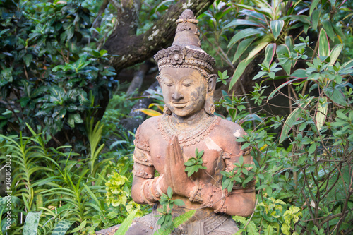 Deva statue in praying hands action