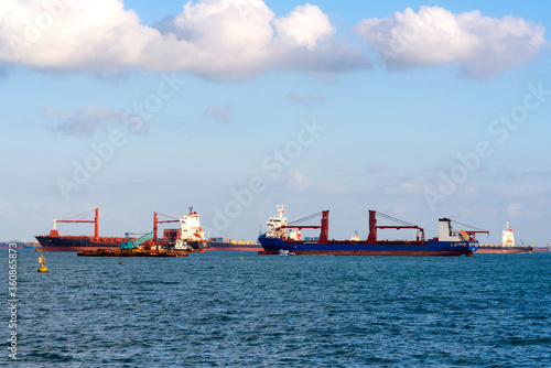 Logistic container ship at shipping yard main transportation of cargo container shipping at Singapore harbour