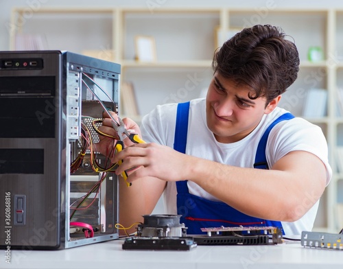 Computer hardware repair and fixing concept by experienced techn photo