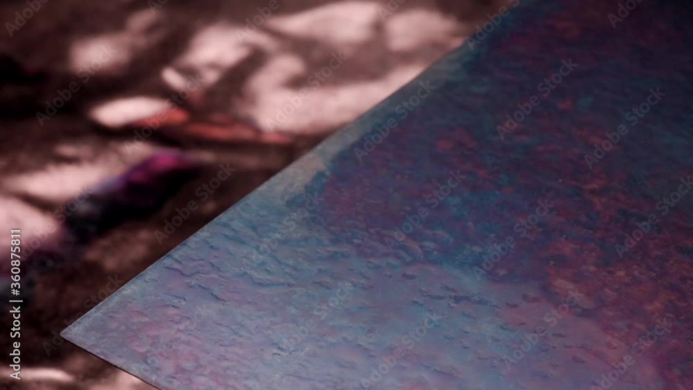 Copper. Drops of water are sprayed onto copper coating. Copper