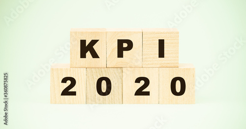 Key Performance Indicator KPI 2020 acronym word lettering typography design on wooden blocks