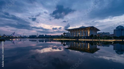 4K Dramatic sunrise timelapse during blue hour at the iron mosque or also known as Tuanku Mizan Zainal Abidin by the lake at Putrajaya, Malaysia.
H
