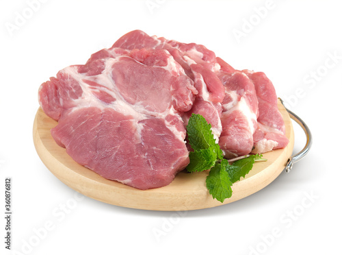 Pork Ridge on wooden plate isolated on white background.