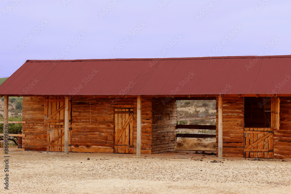 a wooden stable in chilean country landscape a wooden stable in chilean country landscape