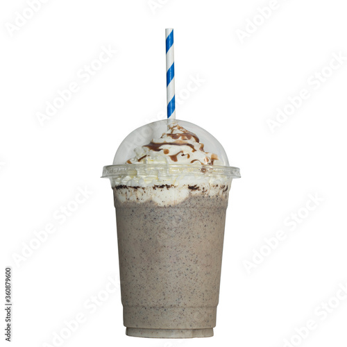 Chocolate milkshake covered with whipped cream in plastic glass isolated on white background
