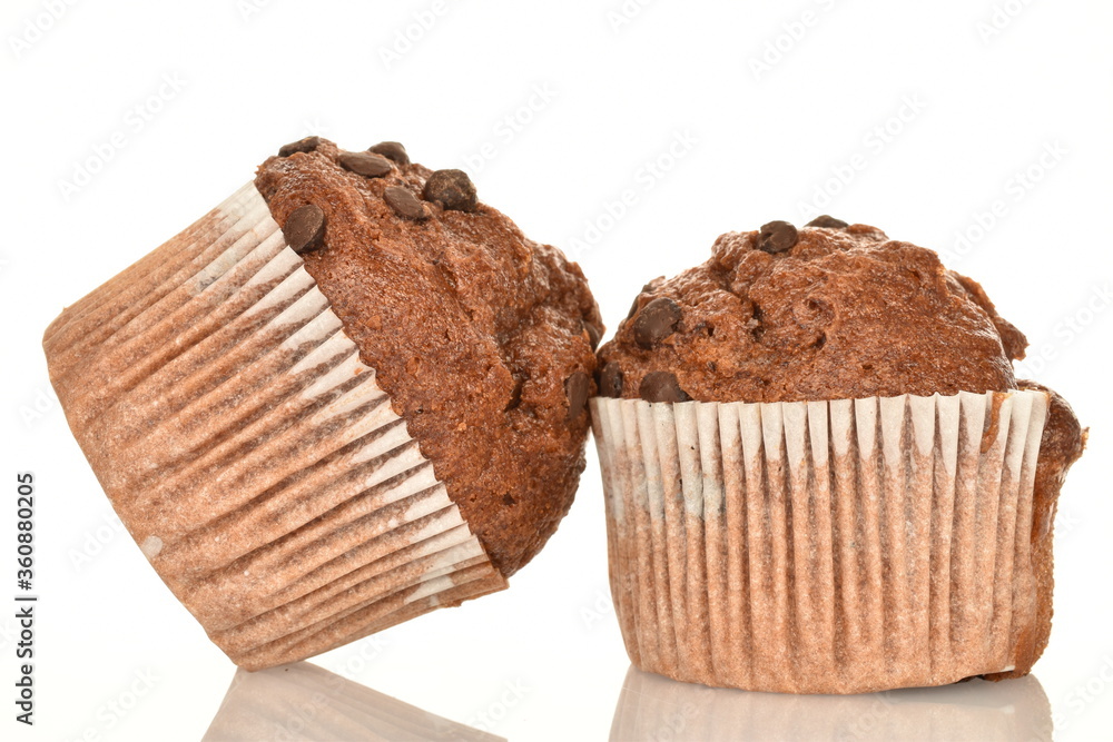 Chocolate muffins, close-up, isolated on a white background. Chocolate muffins, close-up, isolated on a white background.