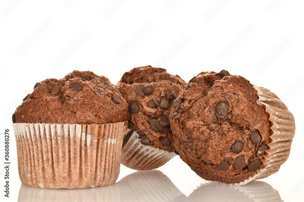 Chocolate muffins, close-up, isolated on a white background. Chocolate muffins, close-up, isolated on a white background.