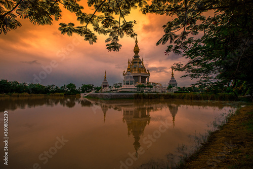 The background of an important tourist attraction in Khon Kaen Province (Wat Thung Setthi) is a large pagoda in the middle of a swamp, tourists always come to see the beauty in Thailand. © bangprik