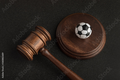 Obraz na plátně Wooden judge gavel and toy soccer ball