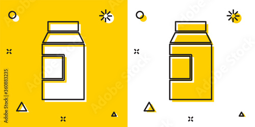 Black Paper package for milk icon isolated on yellow and white background. Milk packet sign. Random dynamic shapes. Vector.