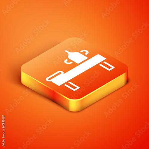 Isometric Massage table with oil icon isolated on orange background. Vector.