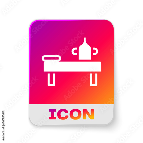 White Massage table with oil icon isolated on white background. Rectangle color button. Vector.