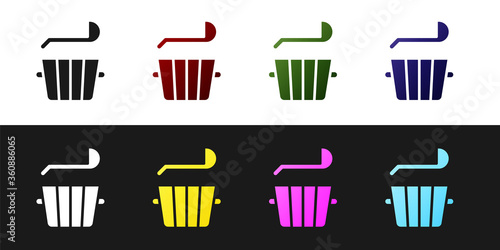 Set Sauna bucket and ladle icon isolated on black and white background. Vector.