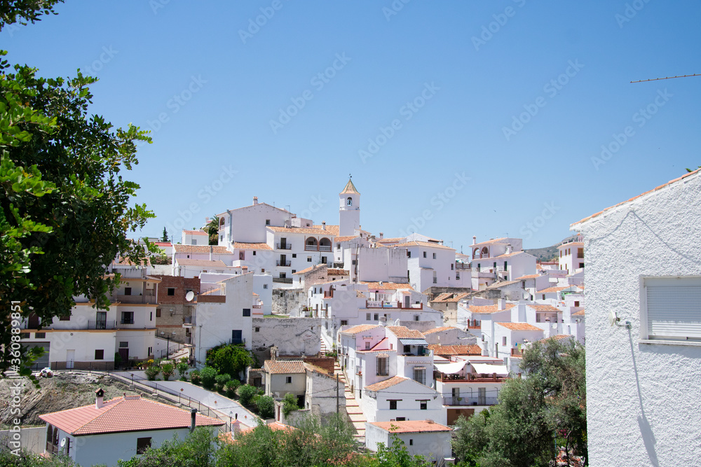Spanish white village with a church