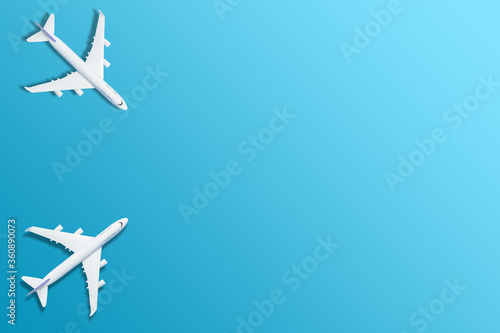 white airplane on a blue background, top view 3d rendering